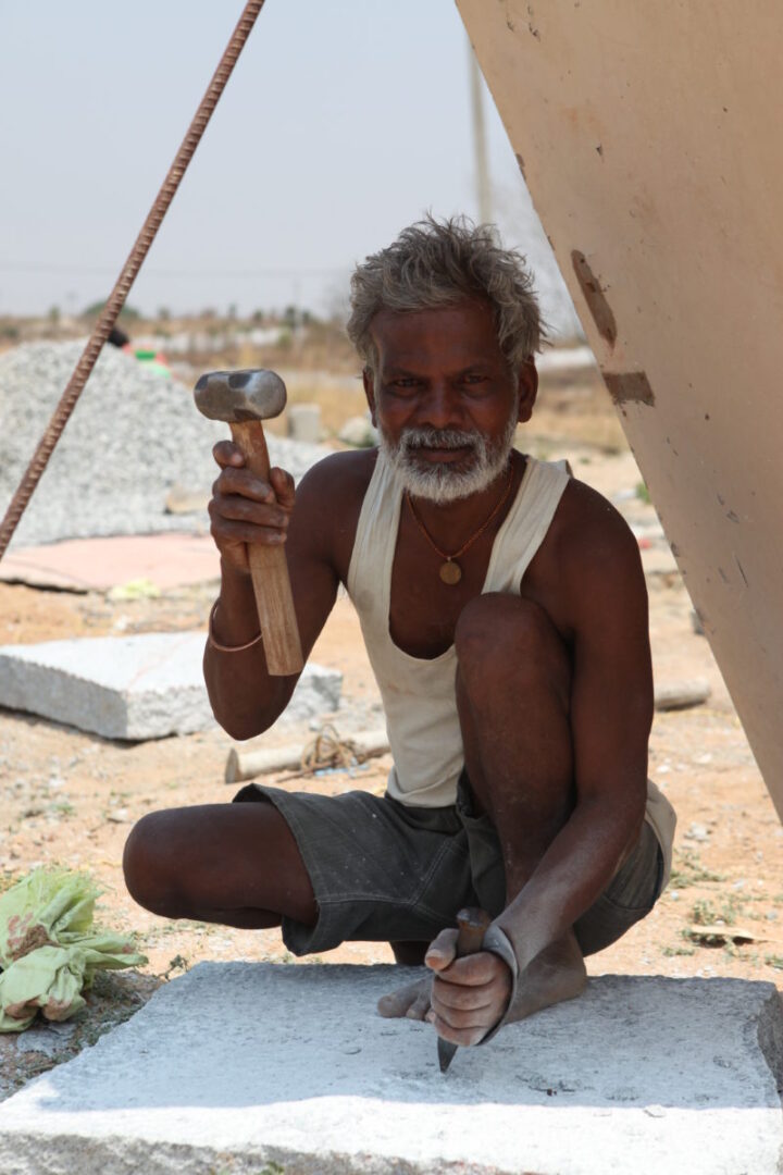 Hindu Man with a chisel